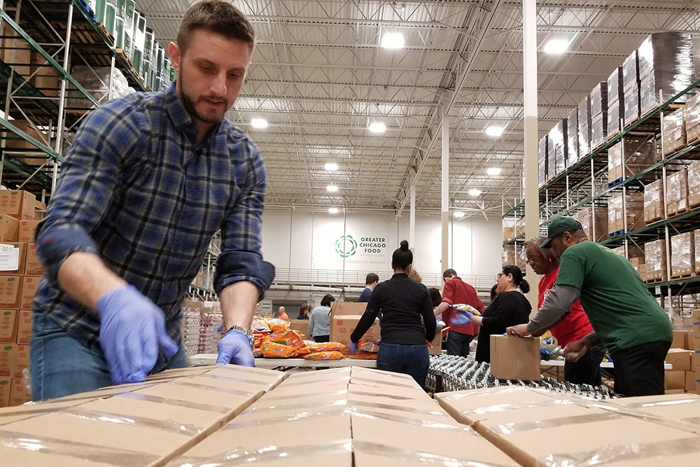 Greater Chicago Food Depository people working in food distribution center