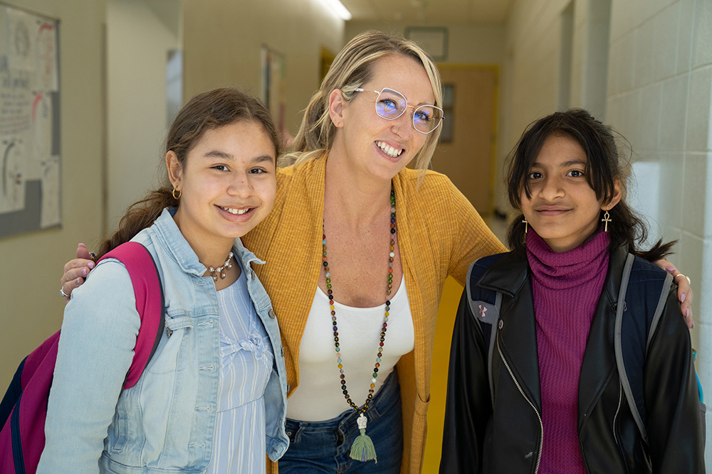 female teacher with two female students at Denver Kids