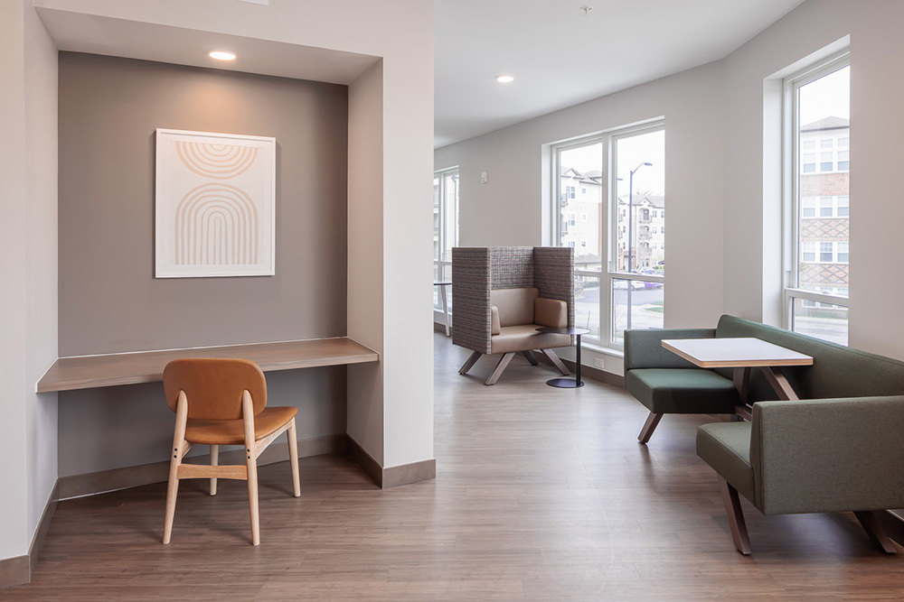 amenity area in apartment building shared work spaces