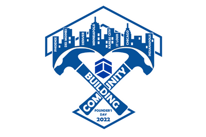 A design for a t-shirt with a skyline of tall buildings in the background with two hammers criss-crossed in the front with Building Community on the hammers.