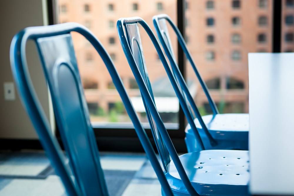detailed view of blue chairs