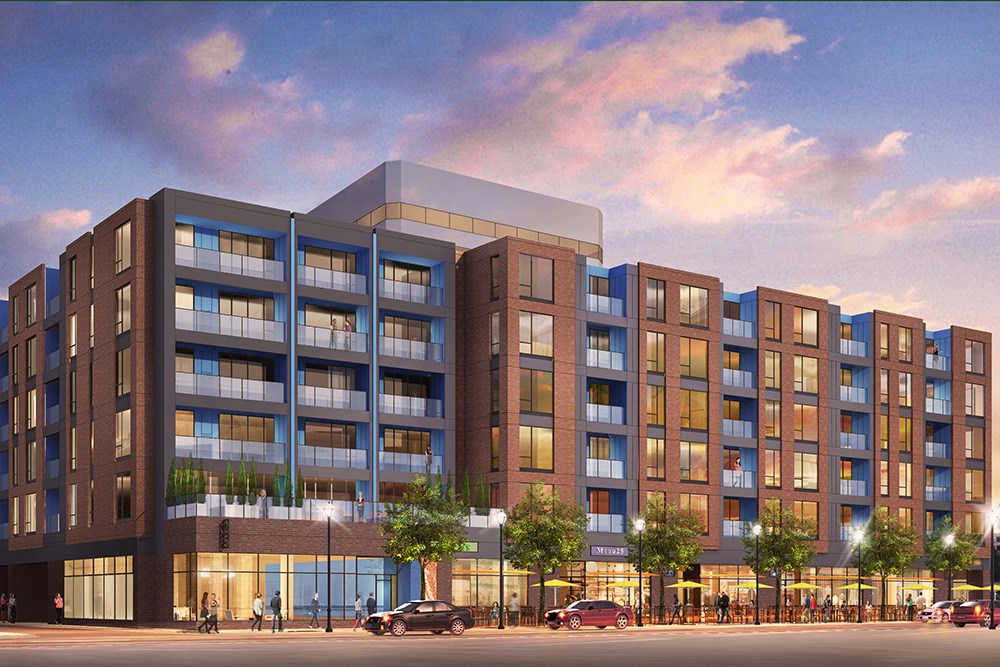 rendering of an apartment building with retail space at street level at sunset