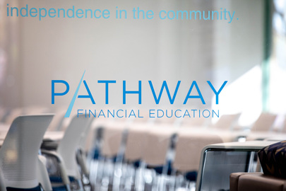 Pathway Financial Education sign on glass