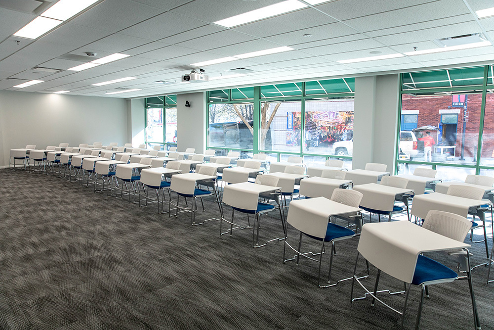 classroom with desks and chairs at Pathway Financial Education building