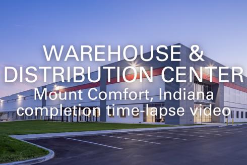 words "Warehouse and Distribution Center, Mount Comfort, Indiana, completion time-lapse video" written in foreground with industrial building in background
