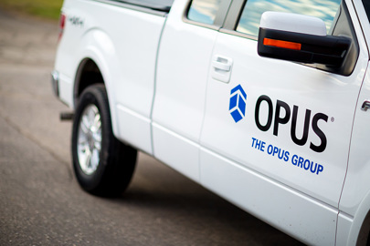 The Opus Group logo on truck