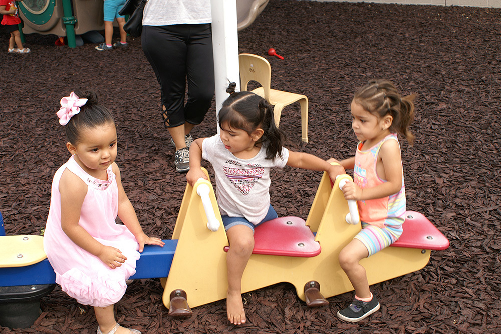 three girls in playground at Child Crisis Arizona