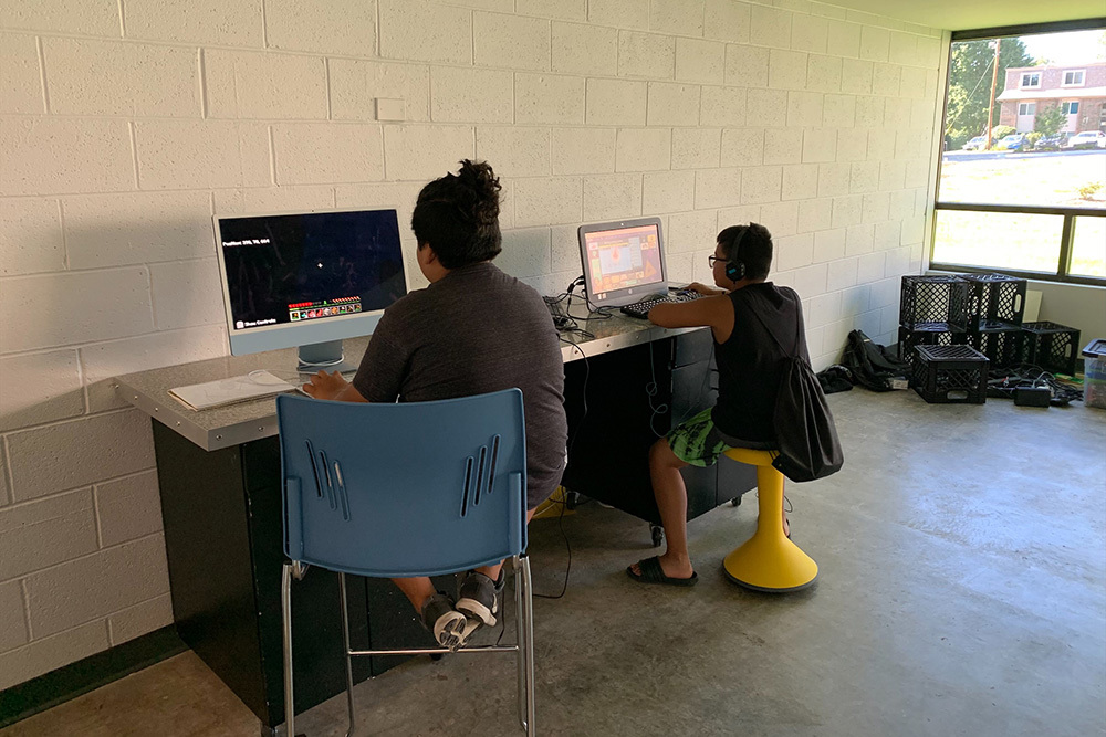 Teenagers using computers