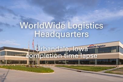 Exterior of office building with "WorldWide Logistics Headquarters, Urbandale, Iowa, completion time lapse"