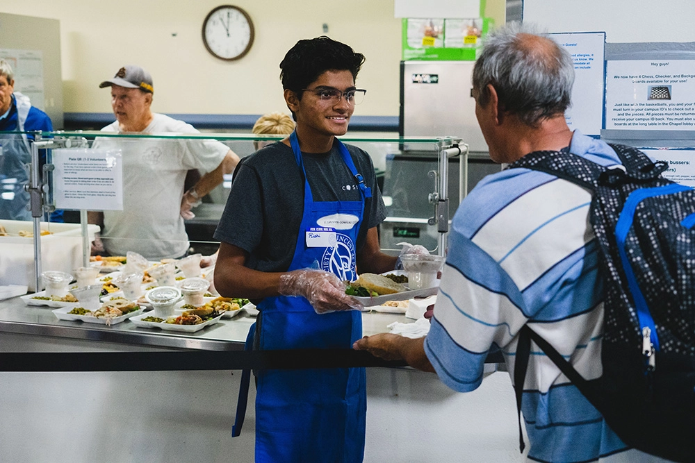 men serving food