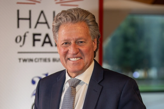 smiling person in professional attire