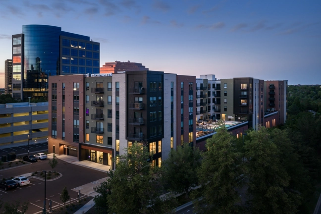 exterior of apartment building at sunset