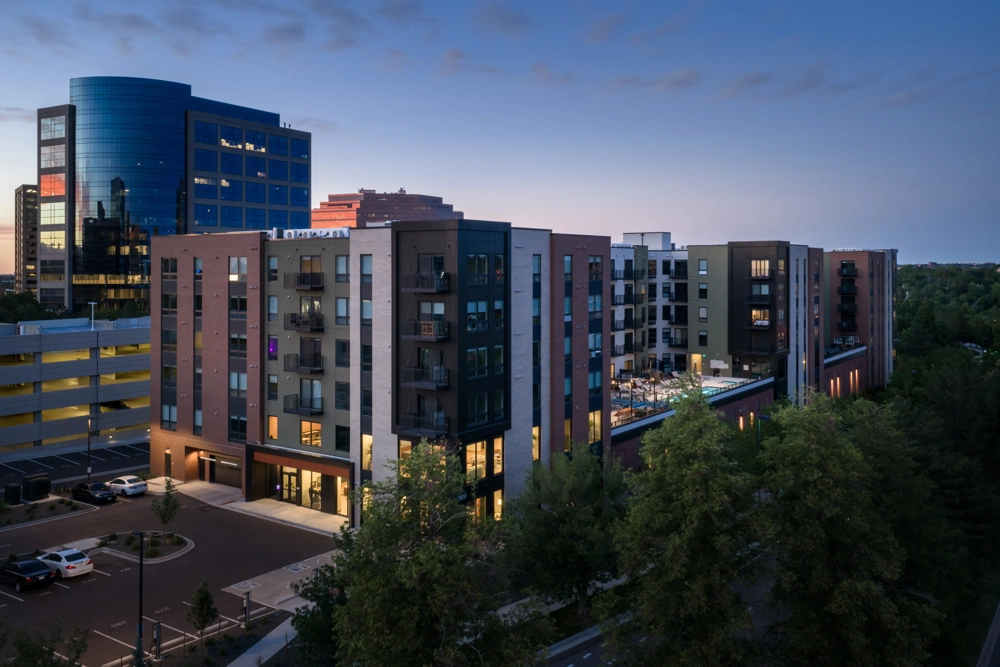 exterior of apartment building at sunset