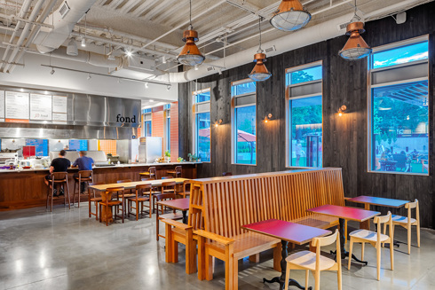 Strang Hall, a food hall in Edison District in downtown Overland Park, Kansas, by The Opus Group