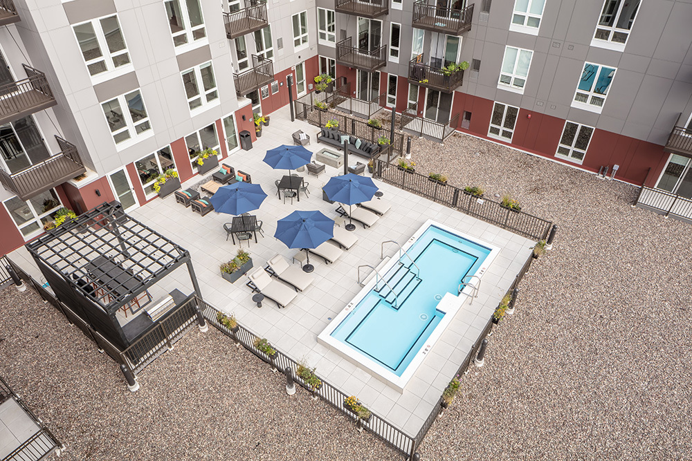 amenity outdoor patio lounge pool of Ellison Luxury Apartments in Illinois