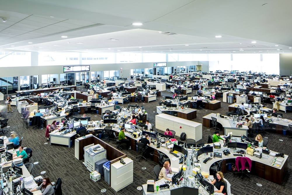 aerial view of people working at desks in an office building