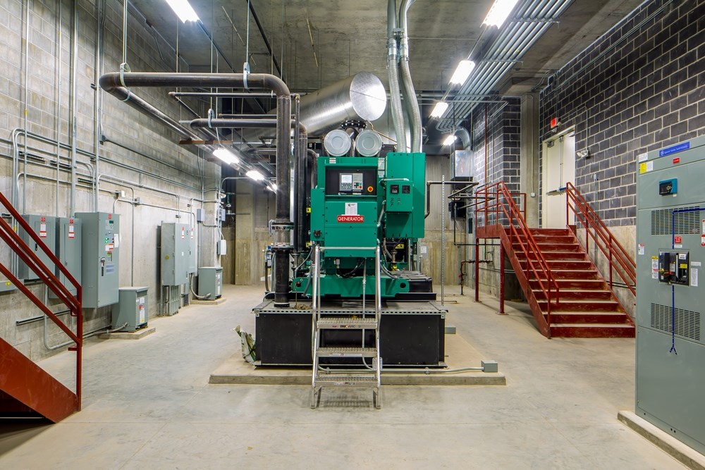 mechanical room in an office building with a generator