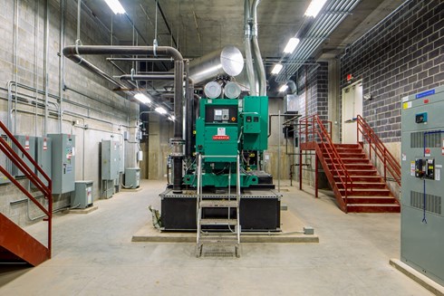 mechanical room in an office building with a generator