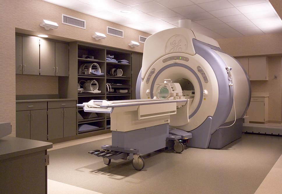 medical exam room in a healthcare building with MRI machine