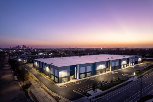  aerial view of a speculative industrial building at dusk