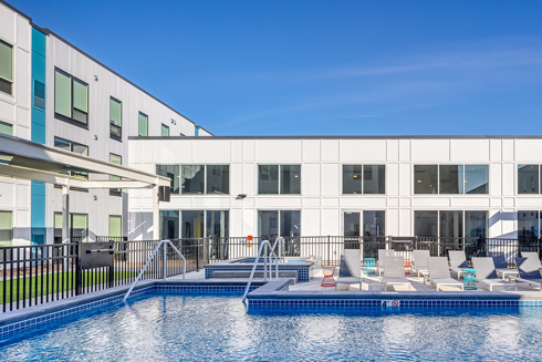 Proxi Lawrence Student Living Development outdoor amenity deck pool