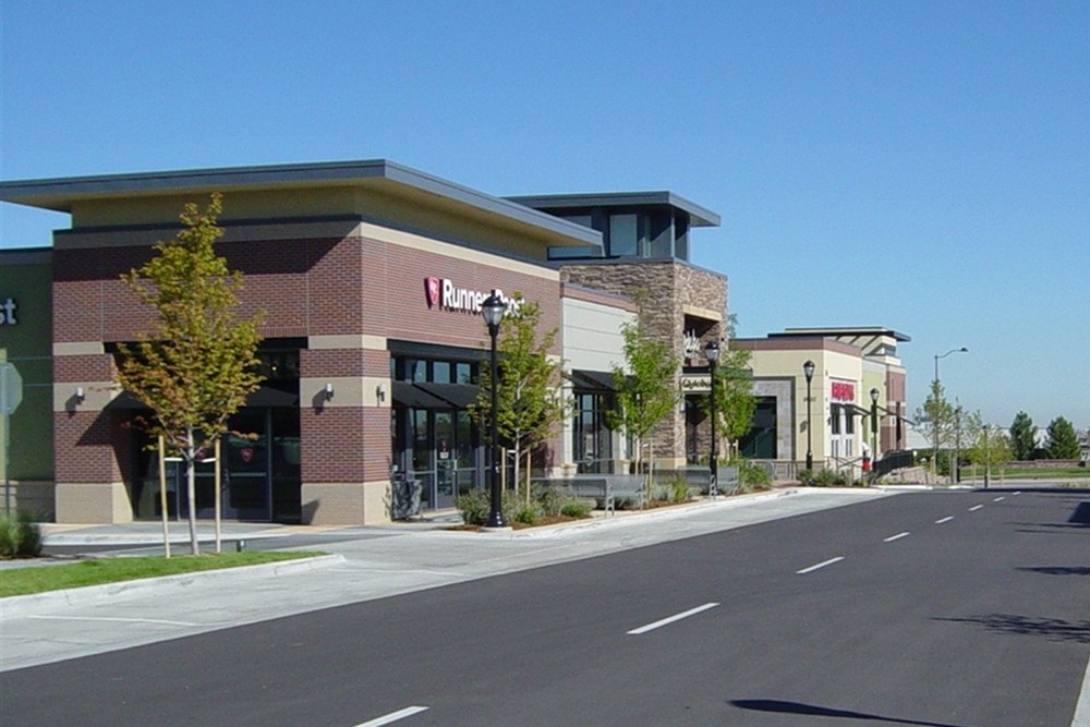 street view of a row of retail buildings