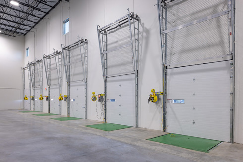 interior view of dock doors in a speculative warehouse